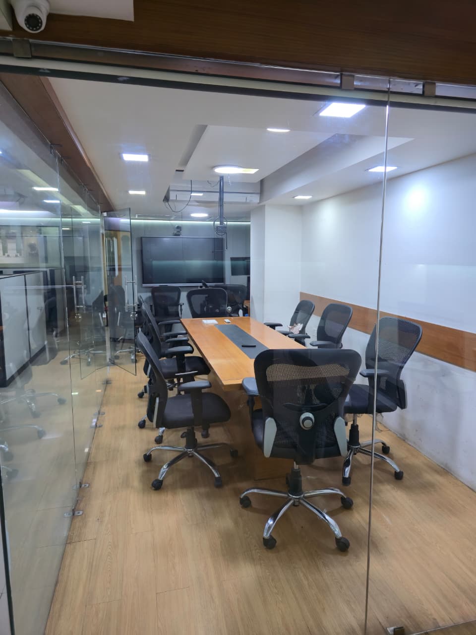 Glass meeting room with presentation screen